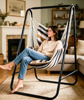 Weatherproof Hammock Chair Stand With Hanging Swing Chair Included, Rugged Iron Frame Supports Up To 450 Lbs in living room setting