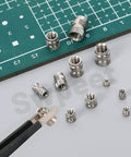 Close-up of 101 Piece Threaded Insert Kit For 3D Printing M2 To M6 In 12 Sizes 303 Stainless Steel Heat Set Inserts and Knurled Nuts.