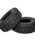 Beefed Up All Terrain ATV UTV Tires 25X10-12 6PR Tubeless Set Of 2 stacked with visible tread and angled shoulder knobs.