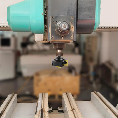 CNC machine with Slab Flattening Router Bit With Two Plus Two Carbide Inserts, One Quarter Inch Shank, TiN Coating for smoother surfacing