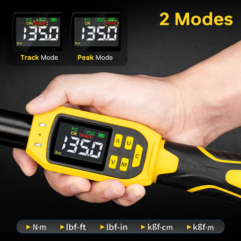 Close-up of 3/8-inch Pro Grade Digital Torque Wrench with LCD display showing 19.50, two modes visible, held in hand