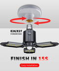 80W Motion Activated LED Shop Light With PIR Sensor For Garage Staircase Basement And Workshop Auto On When People Pass No False Triggers Go To Lighting Upgrade Easy Install 1 Pack demonstrating E26 base installation with arrows