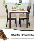 Foldable Self Locking Table Leg Hinges 4 Pack In Golden Iron For Home Furniture in a dining setting, showing folding hinge detail.