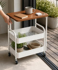 Three Tier Rolling Side Table With Lockable Casters And Spacious Storage Shelves For Hassle Free Room To Room Moving Everyday Utility Cart Stand For Home Organization Built Tough For Any Space with wooden top and two storage baskets.