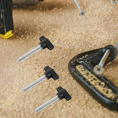 Five Piece M8 X 50 Millimeter Thumb Screw Kit With Wing Knobs for tool free hand tightening on a workbench.