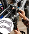 Adjustable Bike Derailleur Gauge for 12 Speed Electronic Drivetrains in use, showing tool-free setup and lightweight alloy construction