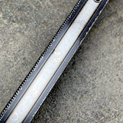 Close-up of the Top Notch Japanese Wood Rasp With Double Sided Grit showcasing dual grit blade details on steel.