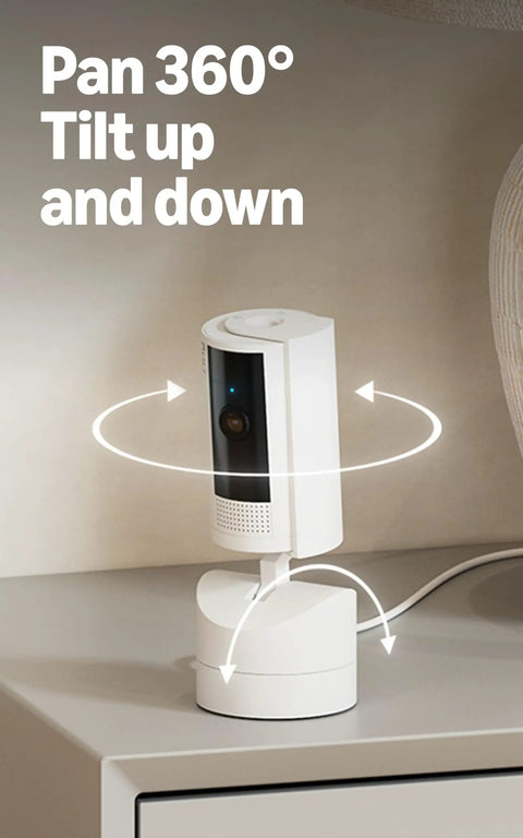 Sleek 360 Degree Pan Tilt Indoor Security Camera With Crisp Hd Video And Two Way Talk For Keeping Tabs On Your Space Plus Instant Smart App Alerts And Clean White Case For A Solid Setup You Know You Need Right Now, displayed on a bedside table.