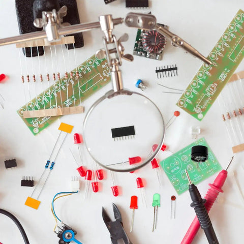 Dope Dual 555 Timer Circuit Kit for Electronics Training and DIY Projects laid out with tools and components.