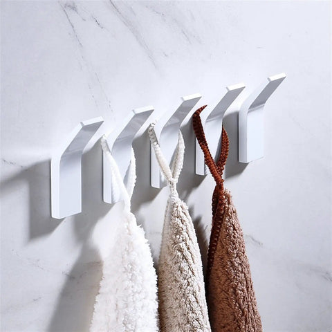 Heavy Duty Punch Free Wall Mounted Coat Hooks Premium Aluminum Alloy Build No Hassle Sticky Mount holding towels on a wall.