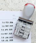 Slick Ergonomic Rubber Date Stamp With Comfortable Grip And Multifunctional Design For Scrapbooking And Office Documents showing date impressions on paper.