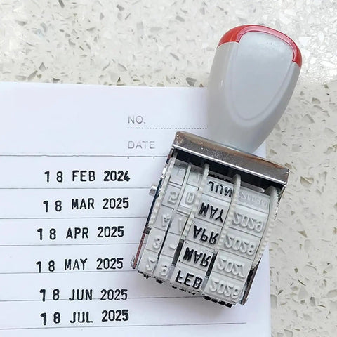 Slick Ergonomic Rubber Date Stamp With Comfortable Grip And Multifunctional Design For Scrapbooking And Office Documents showing date impressions on paper.