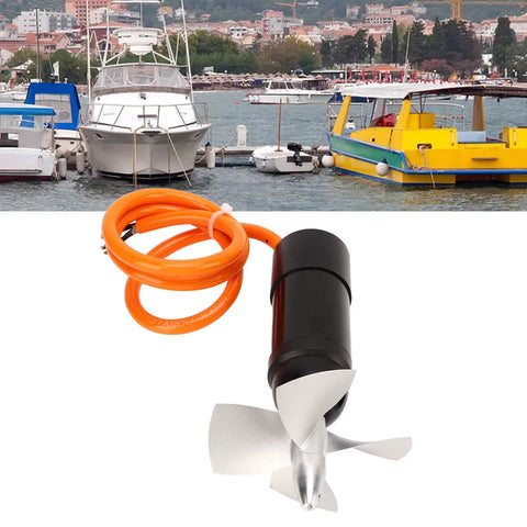 Beefy 48V Underwater Thruster for RC Boats and ROVs, 4000 RPM Aluminum CNC Housing with a 4 Blade Propeller against a marina backdrop