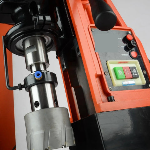 Close-up of Heavy Duty Mag Drill Press For Metal Core Drilling, featuring magnetic base and drill bit setup.