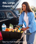Woman using Foldable Trunk Organizer For Cars And SUVs With Dual Large Compartments And Six Mesh Pockets Keeps Groceries Tools And Gear Neatly Stowed In A Sturdy Black Car Accessory For Sedans And SUVs in open trunk.