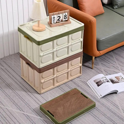 Heavy Duty Collapsible Storage Bins With Lid, Tough Camping Organizer Box For Car Trunk And Groceries, Converts To A Rock Solid Sitting Stool, 50 Liter Green Bin stacked with lid on a modern living room floor.