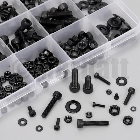Black hex socket screws, nuts, and washers in a clear organizer box, part of Brass Heat Set Threaded Inserts Kit With Hex Socket Screws Nuts Washers For Plastic 3D Printing M2 M2.5 M3 M4 M5 595 Pieces Durable Hardware Set Great For DIY Projects And Repairs.