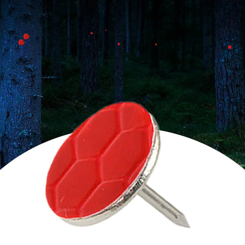 High Visibility Trail Marker Tacks Set 50 Reflective Metal Tacks For Night Hiking and Tree Marking in dark forest scene