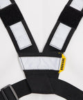 Close-up of Radio Chest Harness Vest Built For The Job And Ready For Everyday Carry with black nylon straps and reflective stripes.