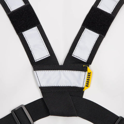 Close-up of Radio Chest Harness Vest Built For The Job And Ready For Everyday Carry with black nylon straps and reflective stripes.