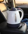 Kickback Ready 24V Car Kettle 1000ML Portable Electric Water Heater For Trucks RVs And Vans on car seat.