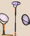 Three In One Rechargeable Electric Fly Swatter With 4200V Bug Zapper, Telescopic Extension, 360 Degree Rotating Head in use