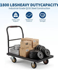 Hella Durable 2000 Lbs Steel Flatbed Cart Rolls Like Butter With Precision Locking Casters For Moving Heavy Gear Around The Workshop Or Warehouse With Rust Resistant Welded Frame Heavy Duty Utility Moving Dolly loaded with weights and boxes.