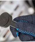 Heavy Duty Air Hammer Drift Set With Pin Punch And Rivet Kit Air Chisel Bits held by gloved hand