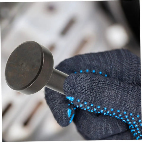 Heavy Duty Air Hammer Drift Set With Pin Punch And Rivet Kit Air Chisel Bits held by gloved hand