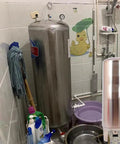 Heavy Hitter Stainless Steel Water Storage Tank 105 Gallon Home Pressurized Expansion Vessel in a utility room.