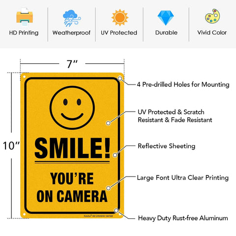 Two Pack Smile You're On Camera Video Surveillance Sign For Home And Business 10 X 7 Inch Heavy Duty 0.040 Inch Aluminum Indoor And Outdoor UV Protected And Reflective CCTV Security Sign showing specifications.