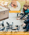 Folding Bird Cage For Pigeons And Small Pets Portable Travel Training Cage with handle, pigeons feeding in park setting