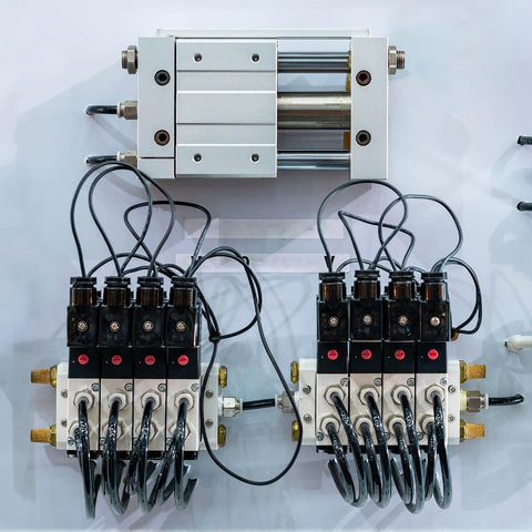 Pneumatic system setup with valves and connections, featuring Long Brass Pneumatic Exhaust Muffler Silence for Solenoid Valves One Eighth Inch NPT.