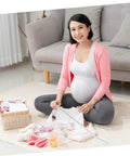 28 Inch Long Reach Grabber Tool Reacher Aid With Firm Grip And Nonslip Hold For Seniors And Pregnant Women Lightweight Plastic And Stainless Steel Pickup Tool For Kitchen Balcony And Home, pregnant woman using it
