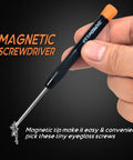 Close-up of a hand holding a magnetic screwdriver with screws for an All-In-One Eyeglass Repair Kit With Magnetic Driver, Small Phillips.