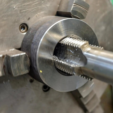 Close-up of M4 X 0.7mm High Speed Steel Machine Tap 3 Flute Straight Taps for Cutting New Threads and Repairing Damaged Threads