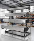 Heavy Duty 4 Tier Lumber Storage Rack With Adjustable Steel Frame And Tough As Nails Build, storing metal pipes in a workshop.
