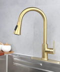 Brushed Gold Pull Down Kitchen Faucet With Sprayer installed in modern kitchen, high arc design, single handle, stainless steel, 1 hole deck mount