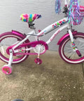 White toddler bike with pink solid toddler bicycle chain cover snap on no tools required protects clothing from chain lube for single speed and fixed gear bikes only easy installation.