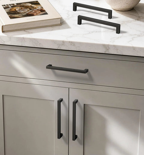 Bombproof Solid Zinc Alloy Matte Black Cabinet Handles 5 Inch Center To Center Kitchen Pulls 10 Pack on a kitchen cabinet.