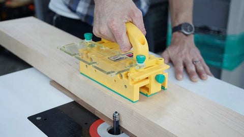 Heavy Duty Chip Deflector Connector Link For Grrripper Pushblocks Table Saw Safety Deck Handles Bridge Kit Router Table in use on wood.