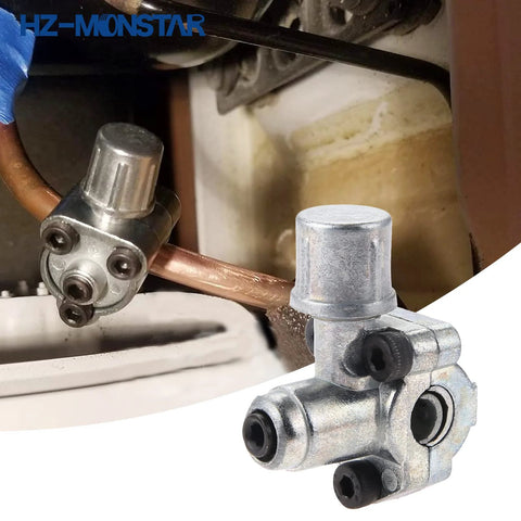 HZ-MONSTAR piercing valve kit for refrigerator tubing; silver service valve attached to copper line (installed).