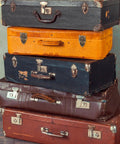Stack of vintage suitcases with Retro Duckbilled Toggle Hasp Latch And Antique Padlock Kit For Small Jewelry Boxes And Cabinets Bronze Finish.