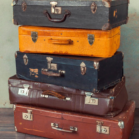 Stack of vintage suitcases with Retro Duckbilled Toggle Hasp Latch And Antique Padlock Kit For Small Jewelry Boxes And Cabinets Bronze Finish.
