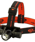 ProTac HL Headlamp With 635 Lumen Output And 8500 Candela, featuring elastic and rubber straps, shown in black and red design