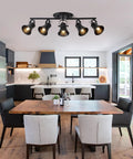 Five Light Track Lighting Kit With Adjustable Heads In Industrial Black installed in modern kitchen