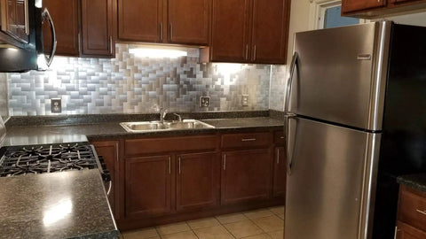 Peel And Stick Metal Backsplash Panels 12 By 12 Inch Square, 10 Piece Puzzle Set In Silver, shown in kitchen installation