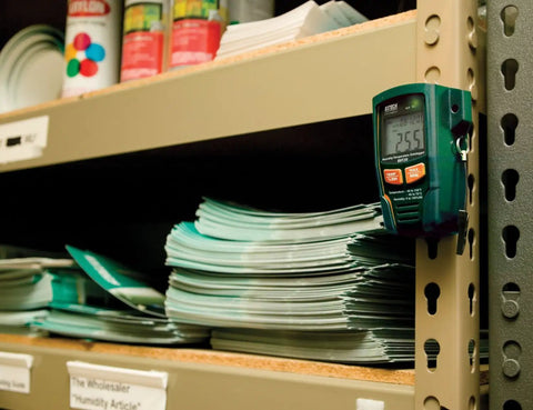 RHT20 Humidity And Temperature Datalogger With 16,000 Reading Memory Dew Point attached to shelf in storage room.
