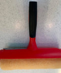 Nine Inch Paint Roller With Integrated Anti Splatter Shield And Heavy Duty Rubber Grip For No Sweat Wall Painting Plus Threaded Socket Attaches To Standard Poles Slick Smooth Coat Reusable Nap Cover Pack Of Ten, showing the roller with a soft nap cover.