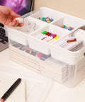 17 Quart Clear Plastic Storage Box With Removable Tray And Five Partition Compartments filled with craft supplies